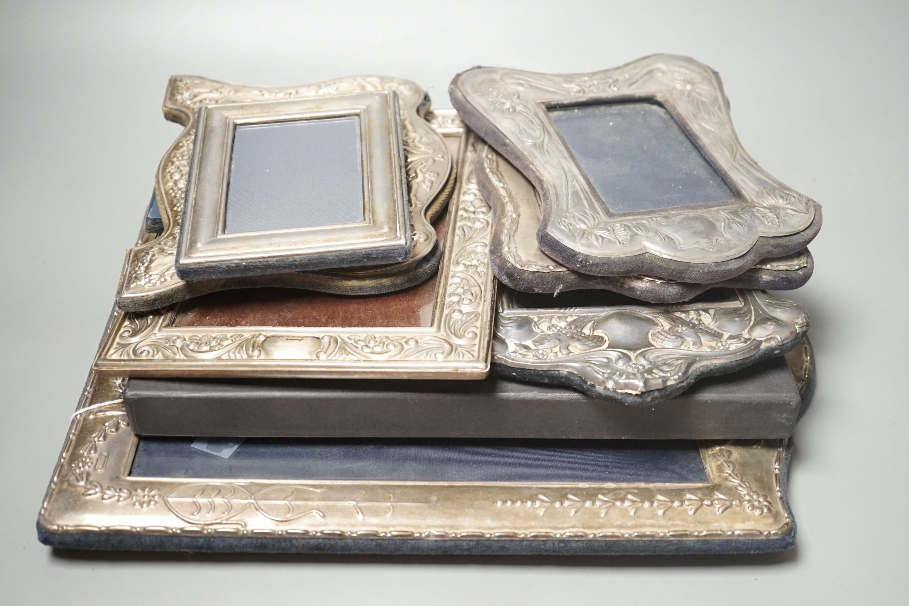 Eight assorted modern silver mounted photograph frames, various date and makers, largest 36.1cm.